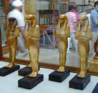 haj_egyptianmuseum10_tut_gold_statues.jpg (43260 bytes)